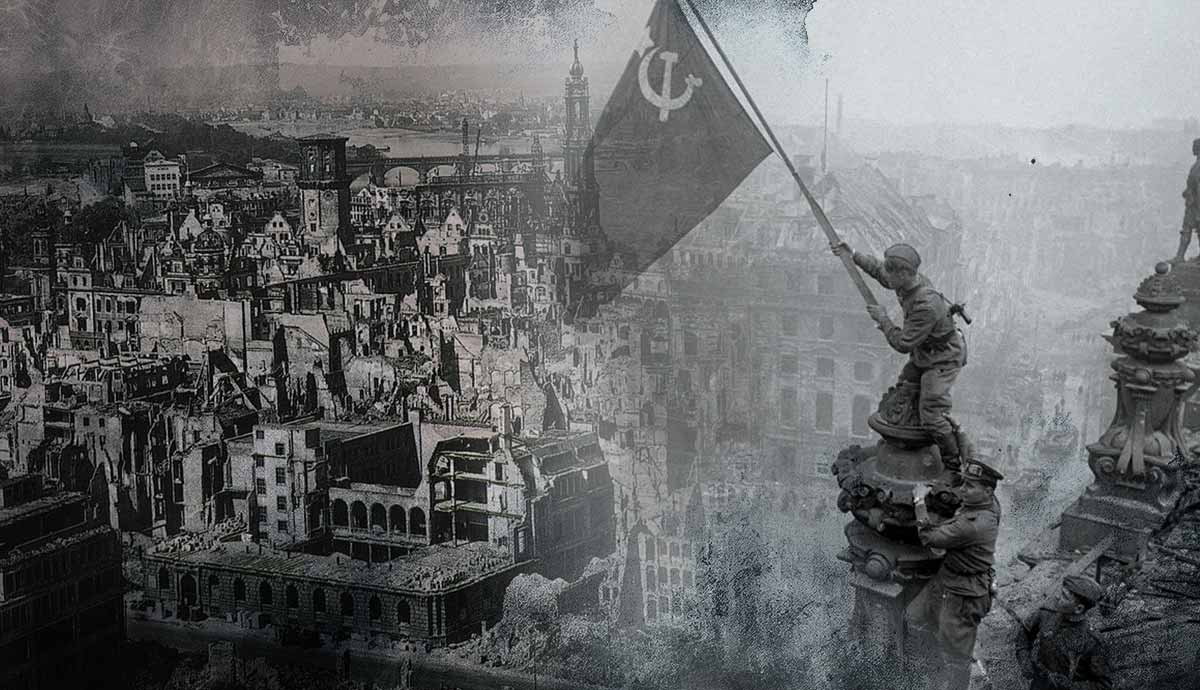 Soviet flag raised over ruined city