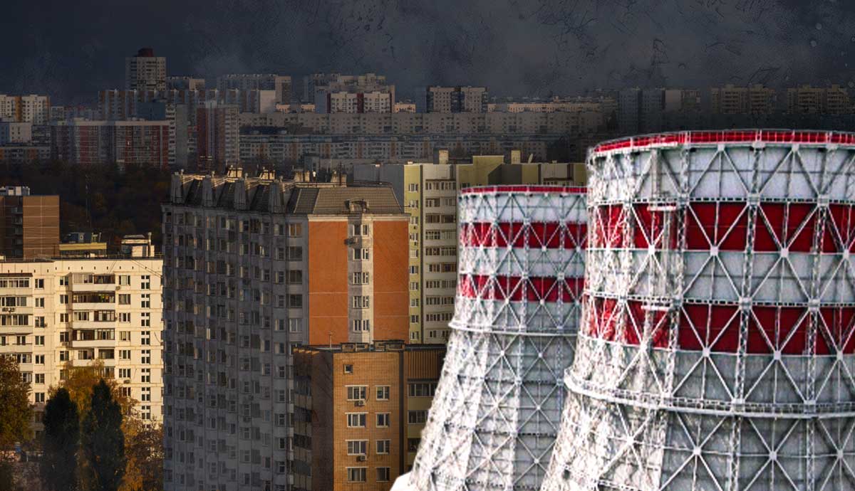 power plants beside dense city skyline