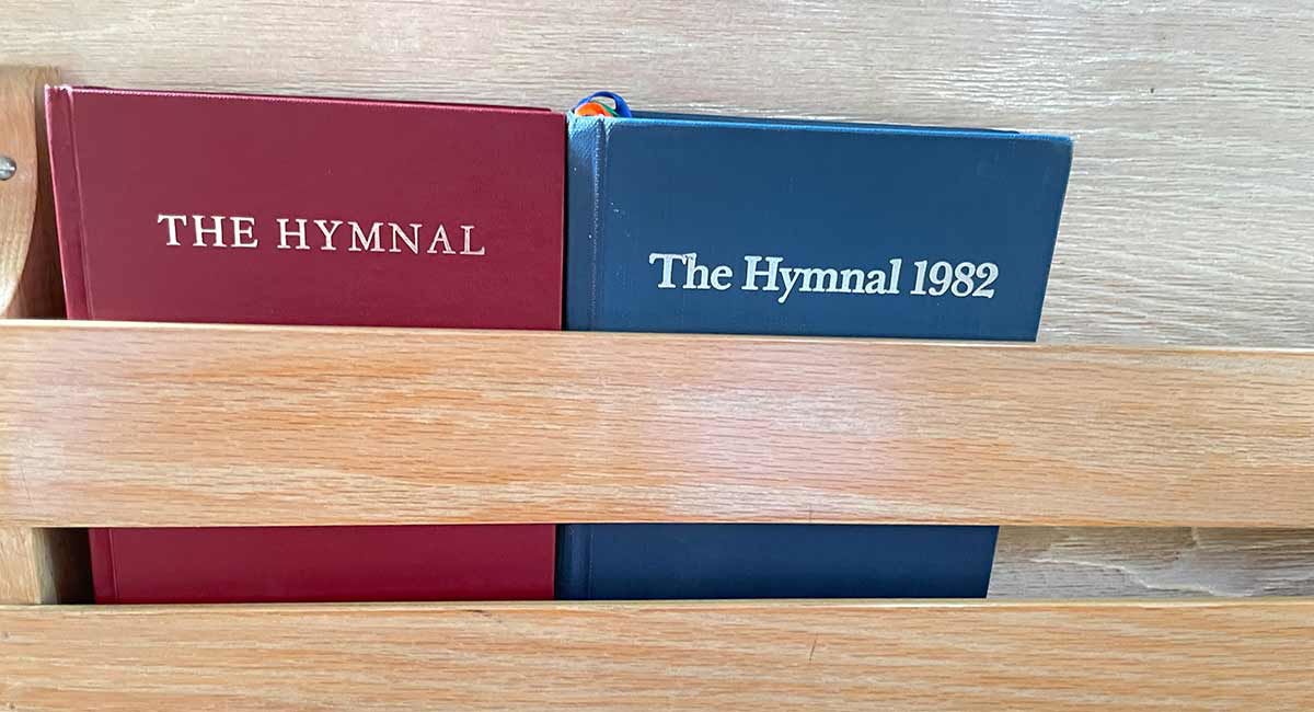 red and blue hymnal books