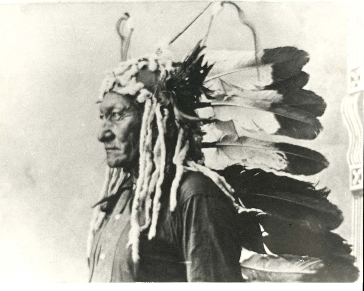 sitting bull wearing headdress