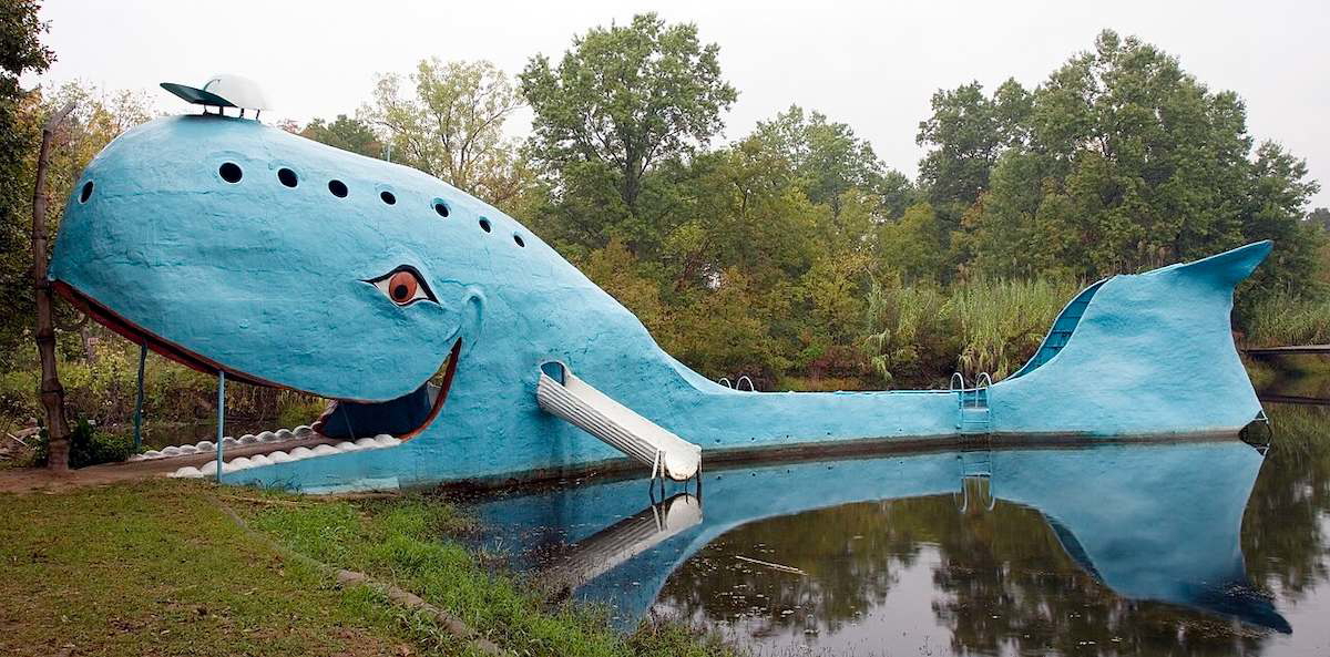Large blue whale sculpture beside a pond on historic Route 66 in Catoosa, Oklahoma