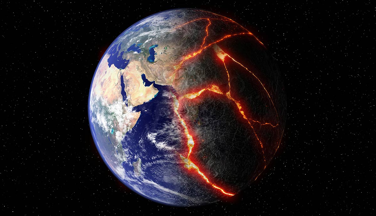 Earth cracked with glowing volcanic fissures