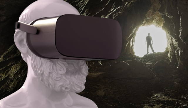Statue in VR headset looking and a cave exit