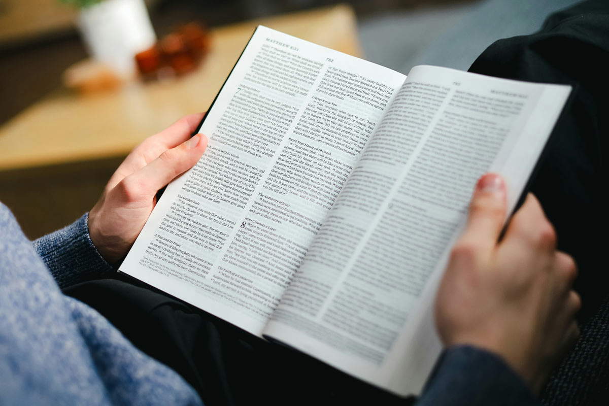 man reading bible study