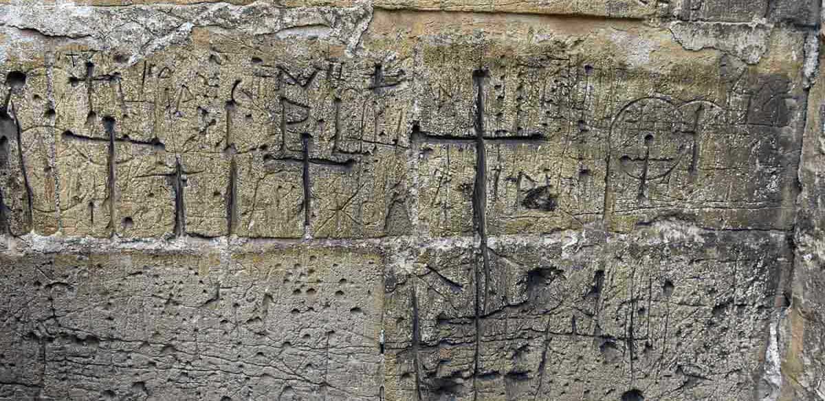 medieval graffiti cross marks larzicourt france