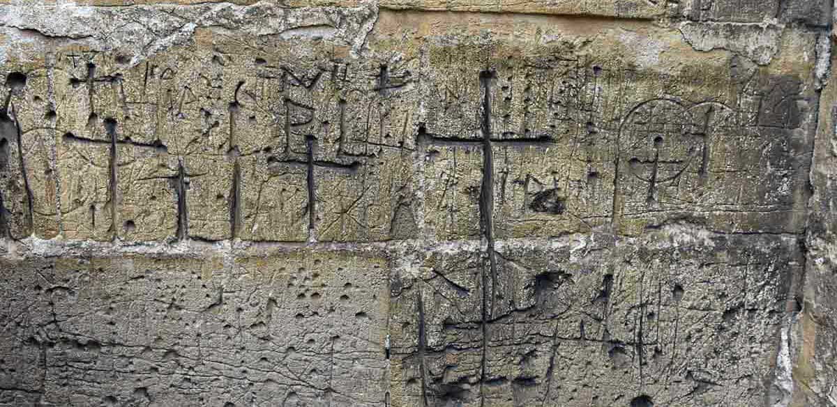 medieval graffiti cross marks larzicourt france