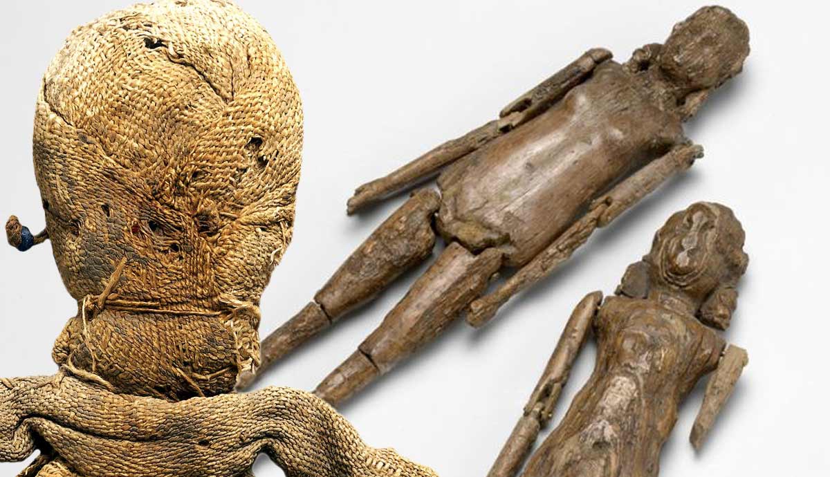 Ancient woven doll beside wooden figurines