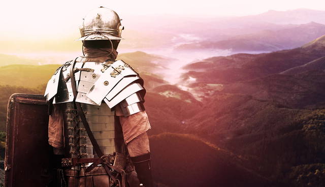 Armored Roman soldier gazes over valley