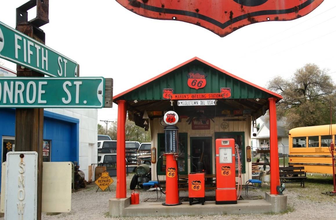 Exterior of Shea’s Gas Station Museum in Springfield, Illinois, with vintage gas pumps and restored signage