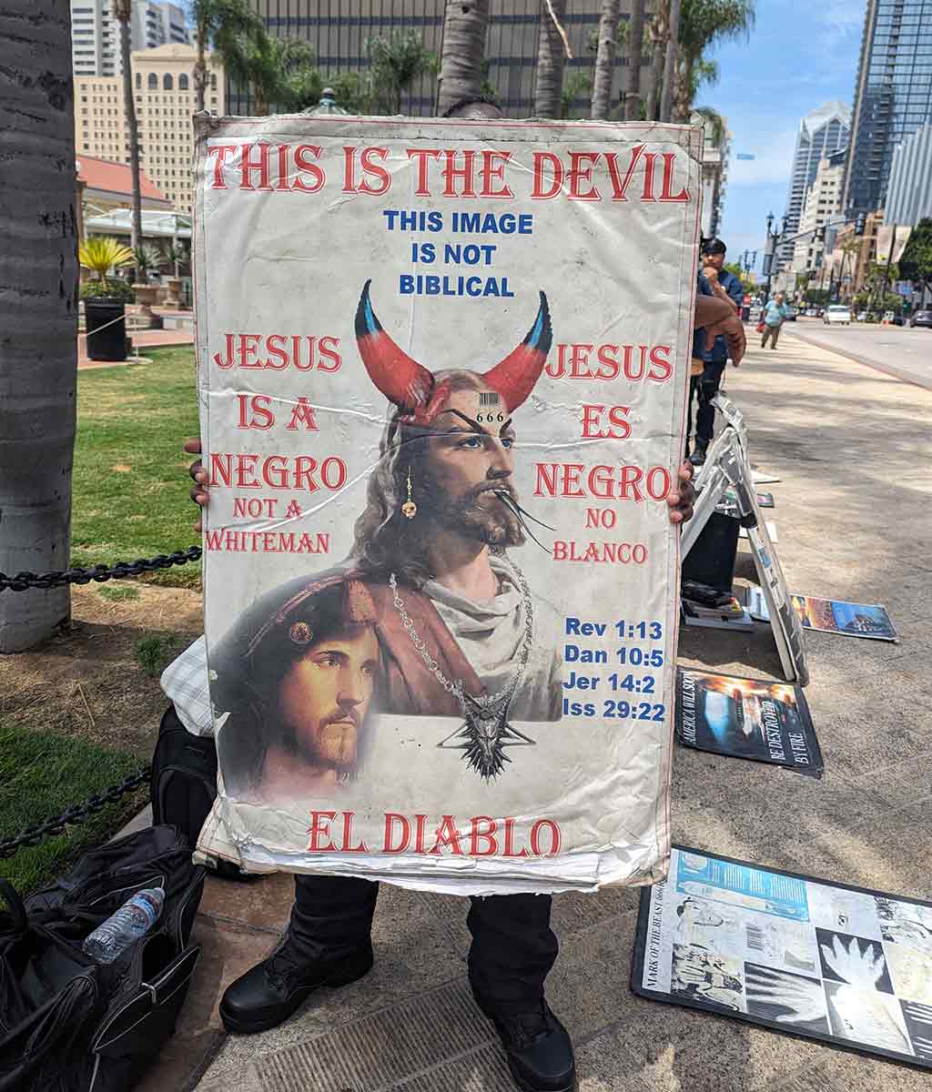 this is the devil black jesus sign photograph