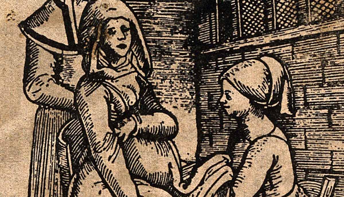 Woodcut of a woman giving birth