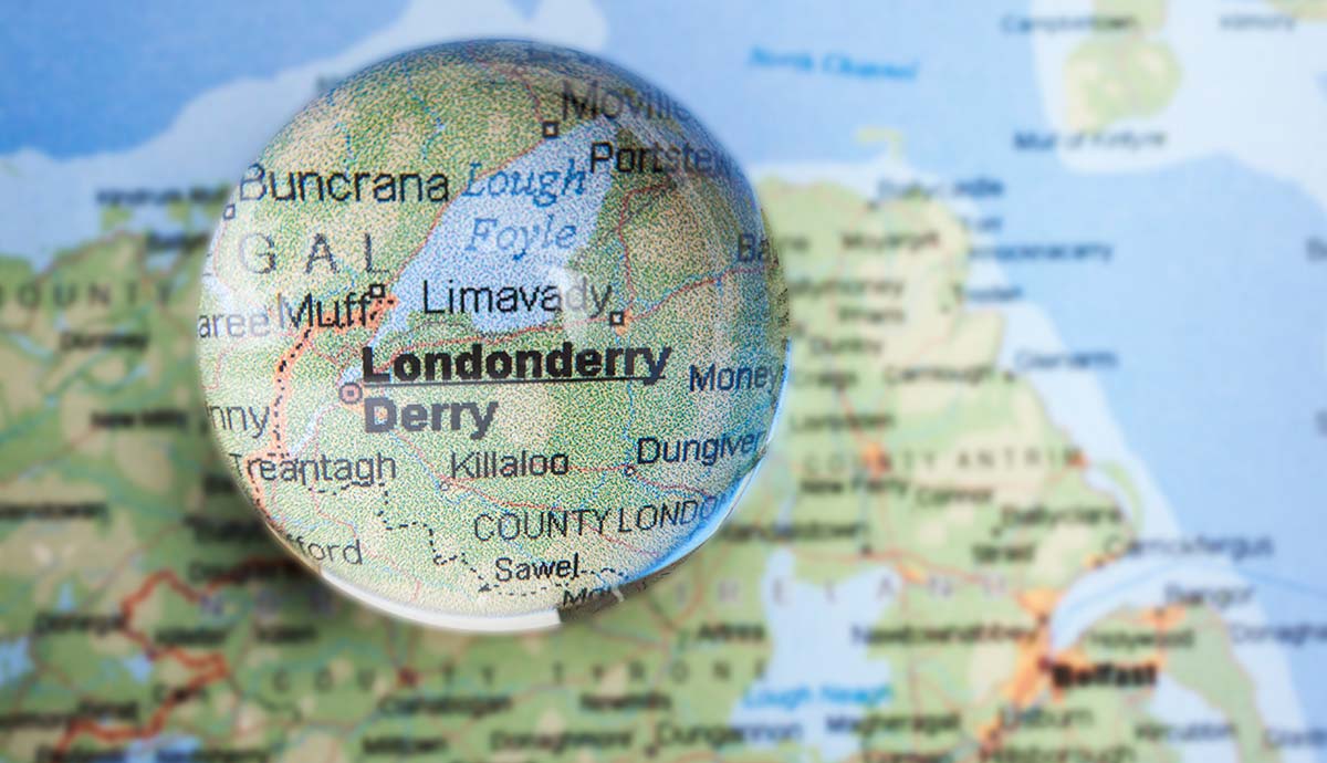 Magnifying glass over a map of Derry