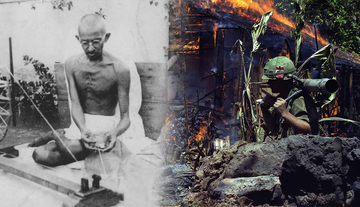 Mahatma Gandhi beside a burning village