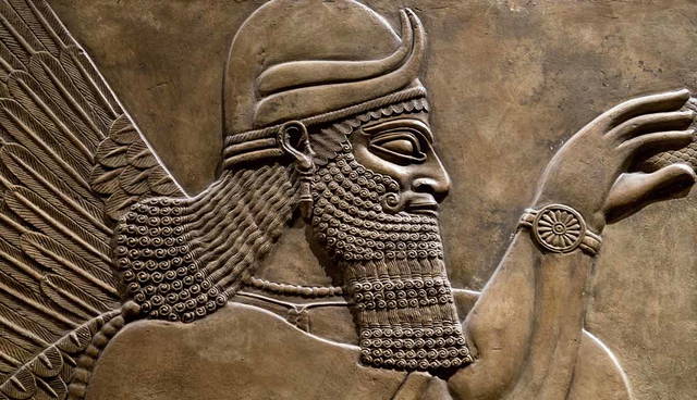 Assyrian deity relief sculpture