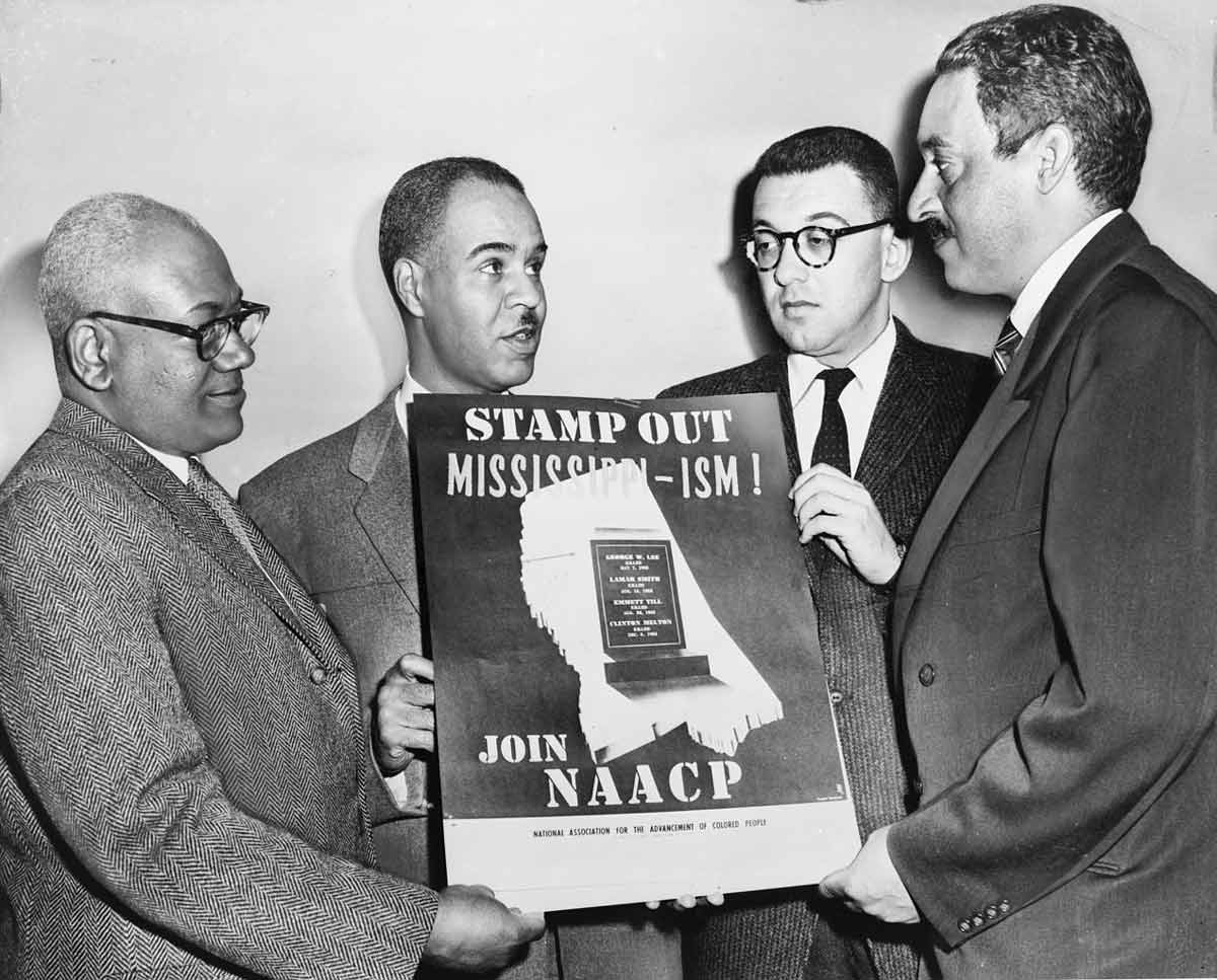 naacp leaders with mississippi poster