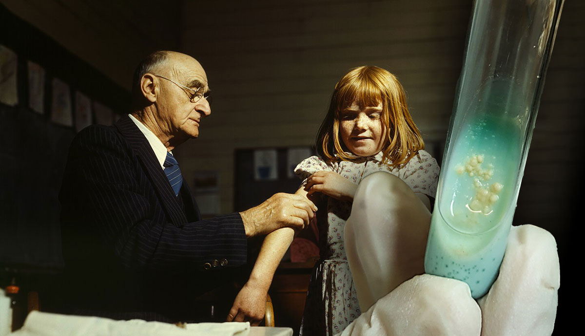 Man vaccinating child next to lab culture