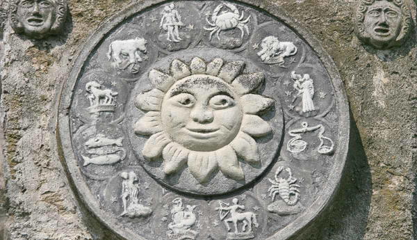 Stone sundial showing the zodiac signs