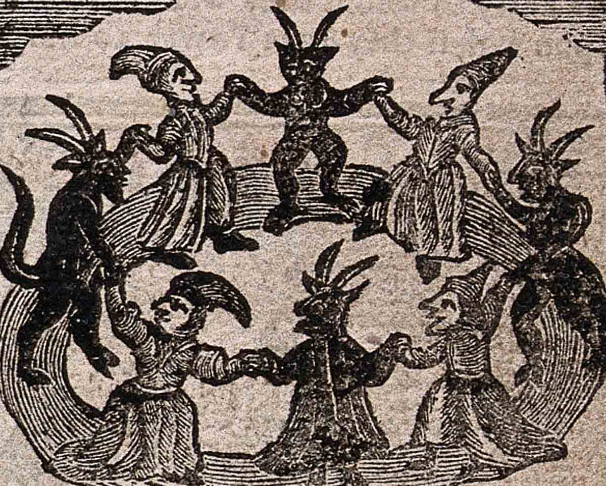 witches devils dancing in circle woodcut