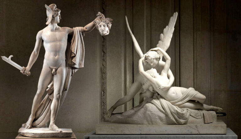 Two white marble sculptures of Perseus and Psyche.