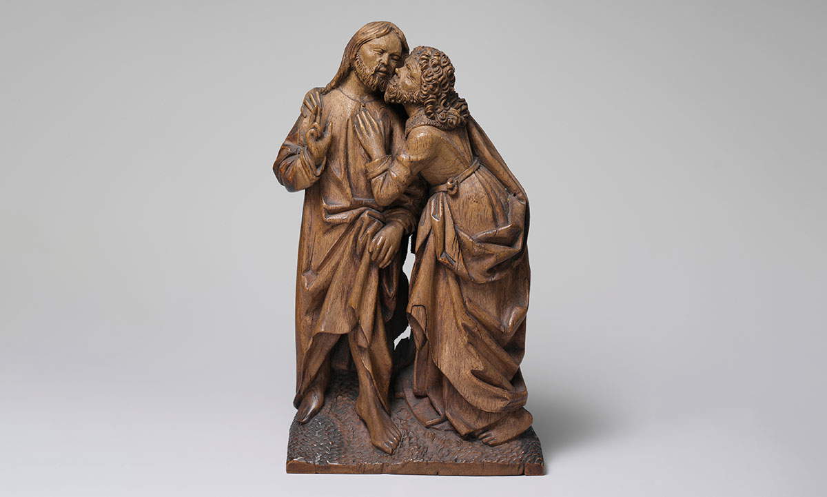 kiss of judas wood sculpture