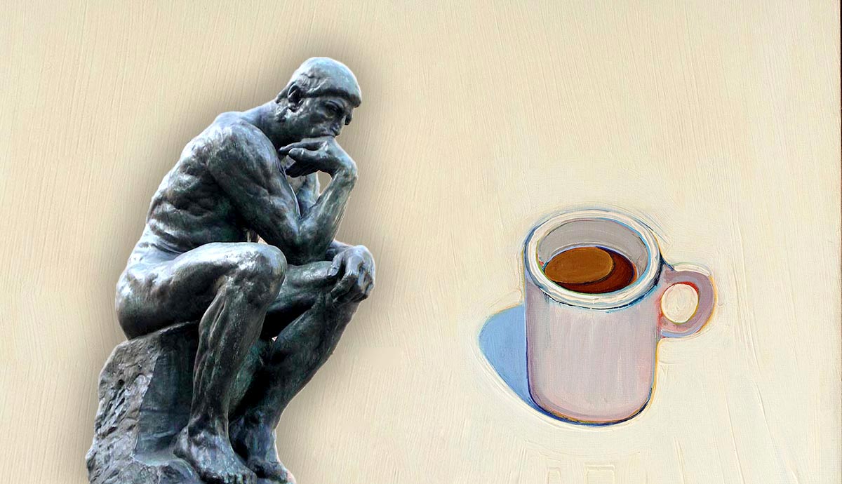 The Thinker sculpture next to a coffee mug drawing