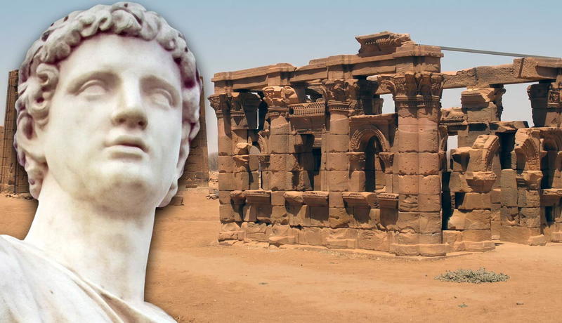 Classical bust beside ancient ruins in the desert