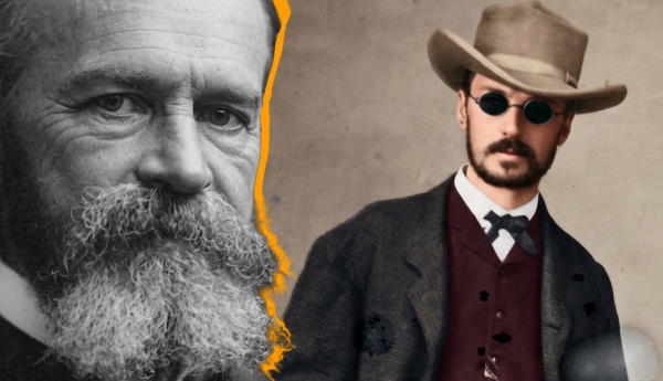 Two bearded men, one older and one in a hat.