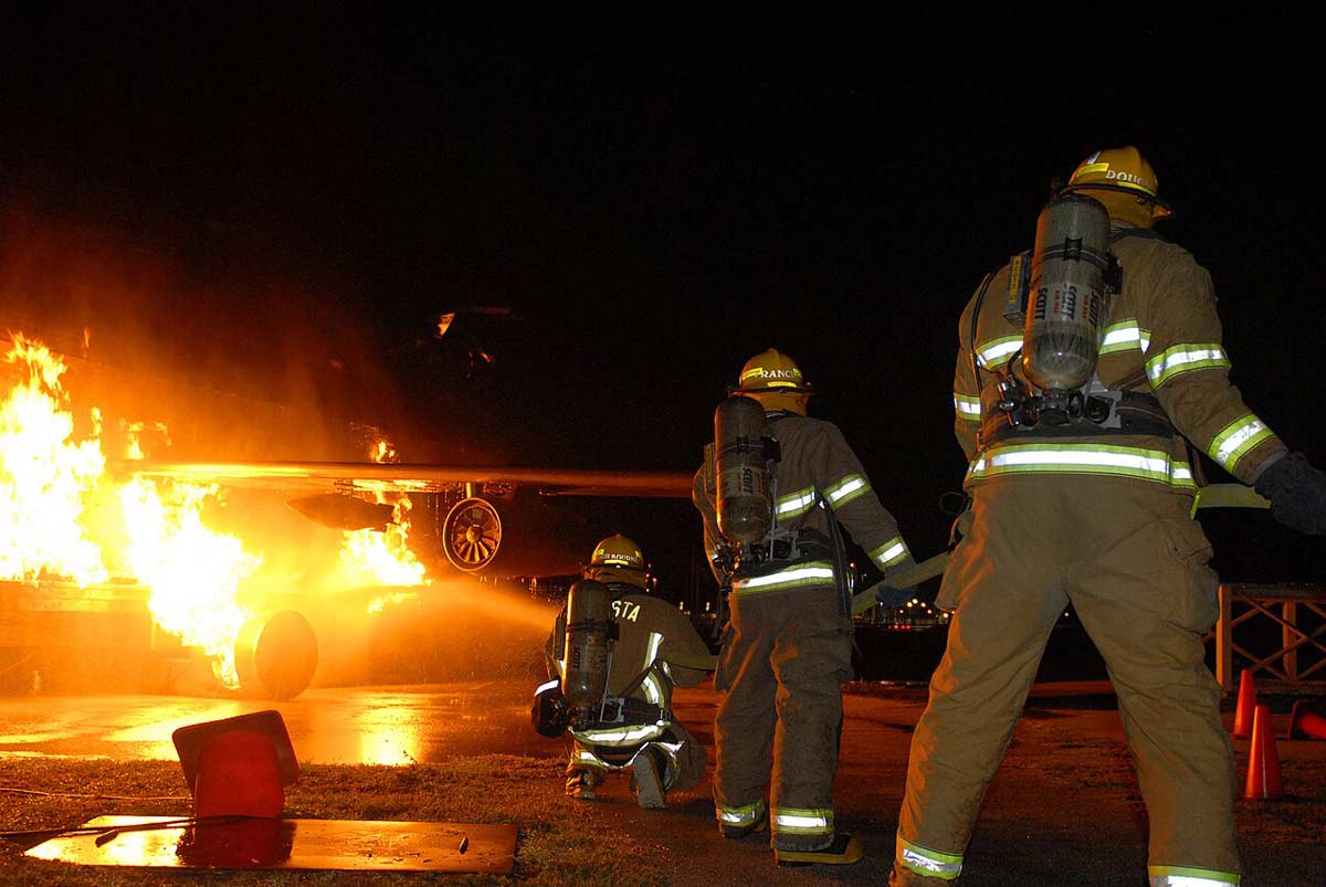 firefighter training holding hose