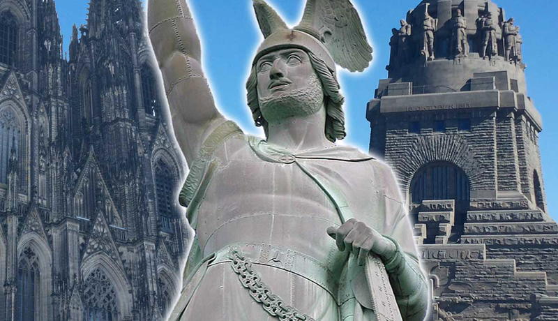 Statue of Arminius with German landmarks in background.