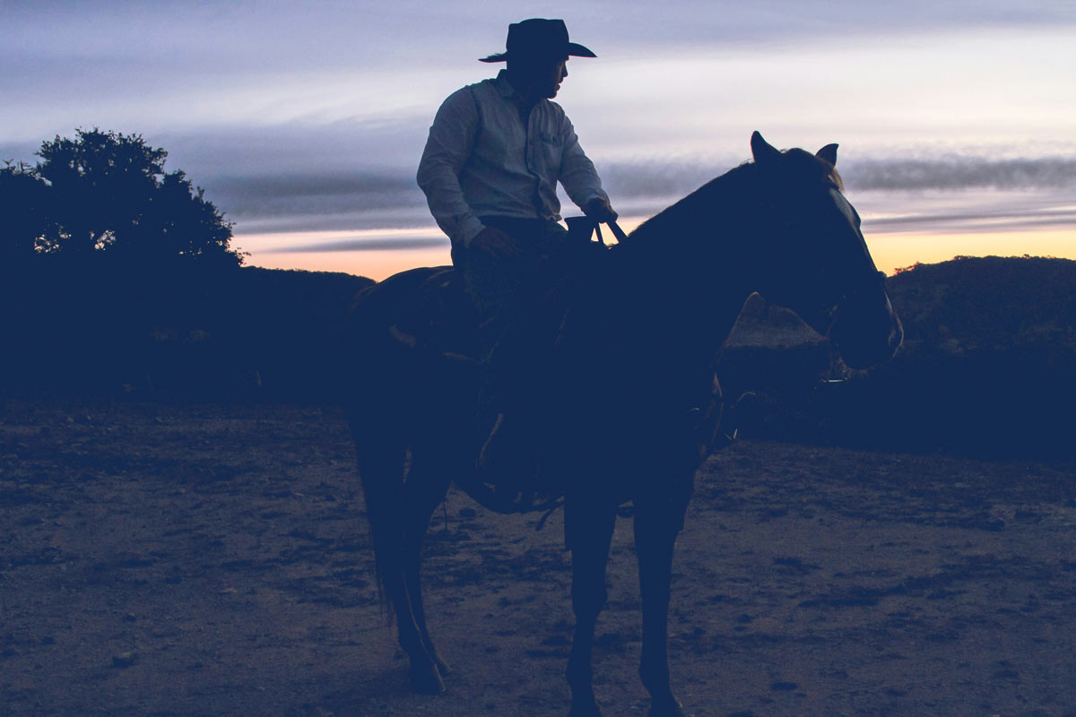 man riding horse