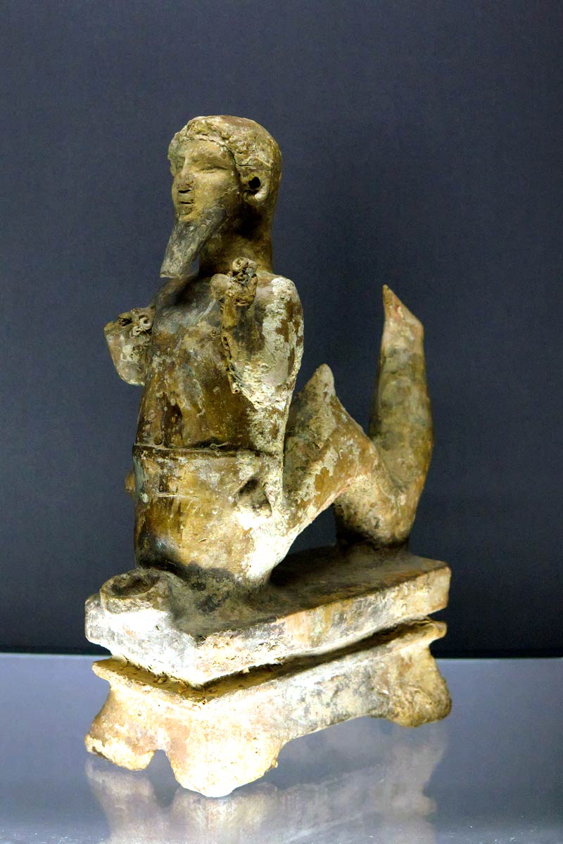 baal statue with tail phoenician god