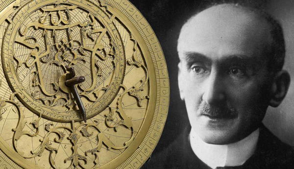 An astrolabe next to a black-and-white portrait.