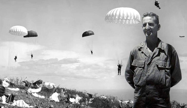 Lieutenant smiles as paratroopers land behind him.