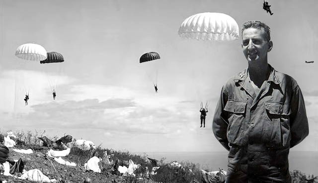 Lieutenant smiles as paratroopers land behind him.