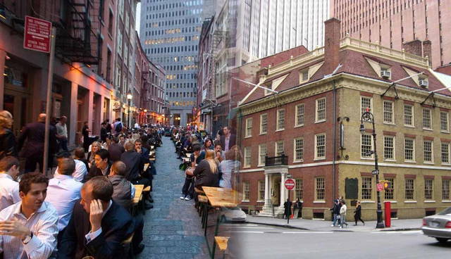 People dining on Stone Street next to Fraunces Tavern