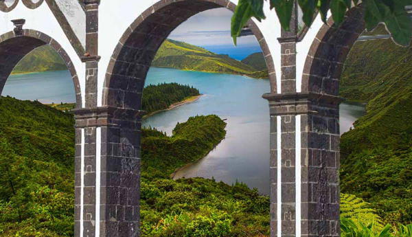 Stone arches framing a lake in São Miguel, Azores