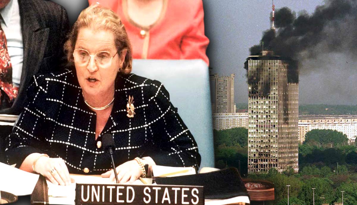 Madeleine Albright at the UN next to a burning building.